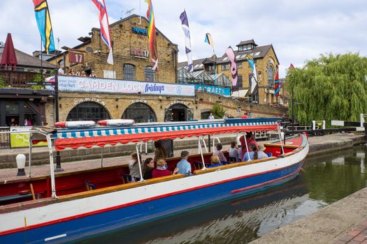 LONDON, UNITED KINGDOM - JULY 20: Camden Lock and Regent's Canal in Camden Town, London's most popular open-air market area on July 20, 2013 in London.