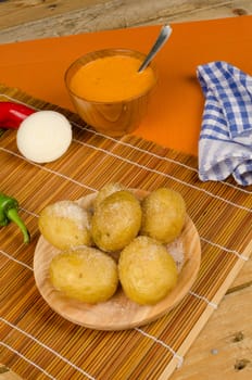 Mojo sauce served with baked potatoes, Canarian cuisine