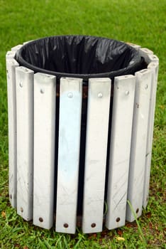 empty trash or garbage bin outdoors in summer