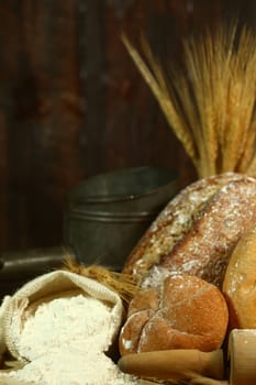 Fresh Baked Bread on Wooden Background