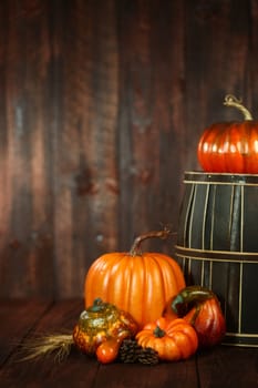 Rustic Fall Themed Scene With Pumpkins on Wood Grunge Background