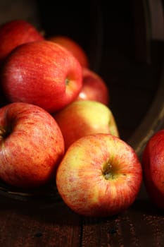 Rustic Barrel Full of Red Apples on Wood Grunge  Background