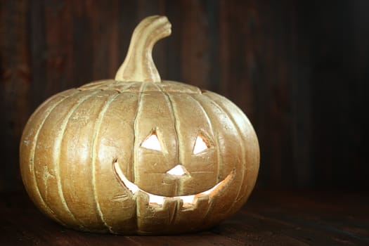 Pumpkin Jack O Lantern on Wood Grunge Rustick Background