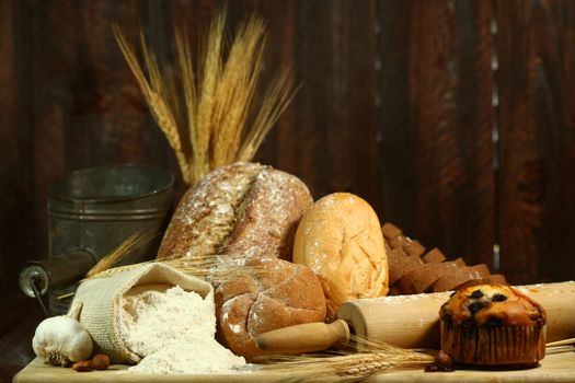 Fresh Baked Bread on Wooden Background