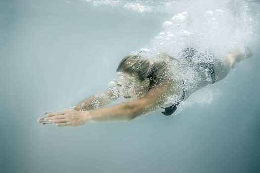 An image of a beautiful diving woman
