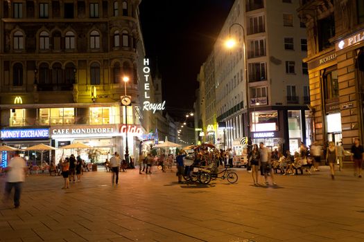 VIENNA, AUSTRIA - JULY 27: Tourists on a central square, Vienna, Austria, July 27, 2013. Every year to Vienna there come about 6,5 million tourists