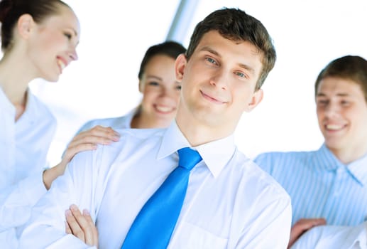 businessman receiving congratulations from his colleagues, business achievements