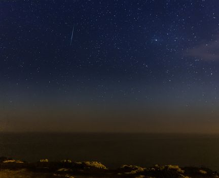 A meteor streaks the sky in Malta during the 2013 Perseid showers