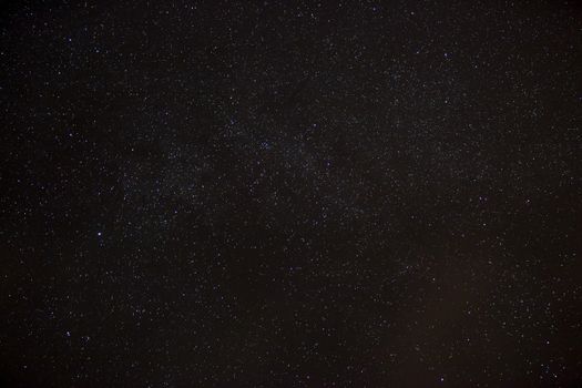 A wide field astrophotographic image showing detail from the Milky Way.