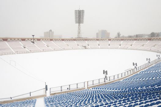 football stadium covered by fresh snow