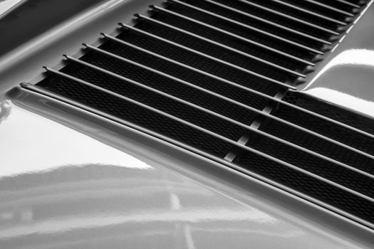Abstract image showing detail fshot from a sportscar bodywork