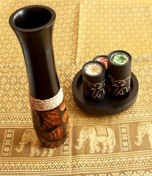 Tablecloth, vase and candles with image of elephants - souvenir from Asia or Africa
