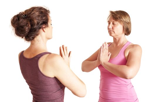 An image of some people doing yoga exercises