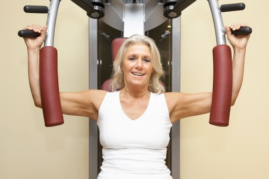 An image of a mature woman doing fitness