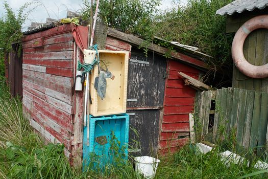 Beautiful rustic wooden old fishing shed by the ocean