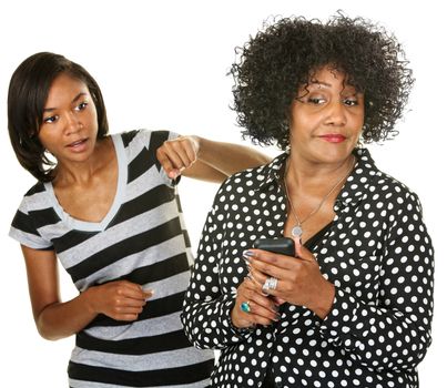 Blushing parent with phone next to nosey teenager