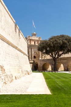 The main gate and newly restored bastion walls surrounding the medieval city of Mdina in Malta