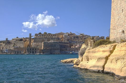 Upper Barrakka Gardens and its new lift as seen from underneath Fort St. Angelo in Vittoriosa