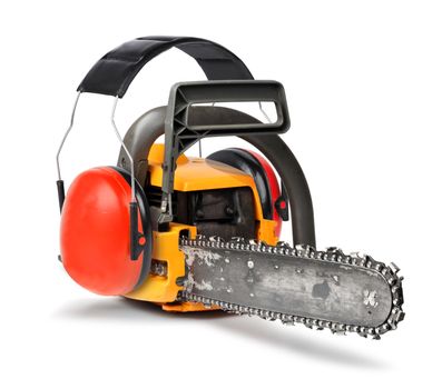 Chain saw  with ear protectors, working safety concept