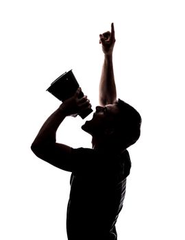 Man yelling in a megaphone in silhouette isolated over white background