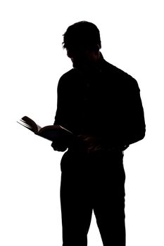 Man reading a book in silhouette and isolated on White background