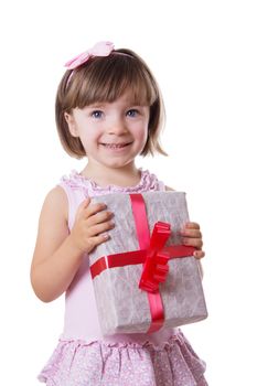Smiling little girl holding present box