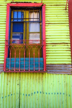 Colorful wall and window in La Boca neighborhood in Buenos Aires