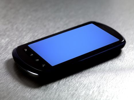 A modern mobile phone on a kitchen bench