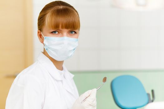 A portrait of a dental worker, dentist or assistant