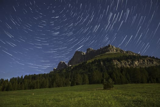 Catinaccio and star trails at the moonlight, Karerpass - Dolomiti