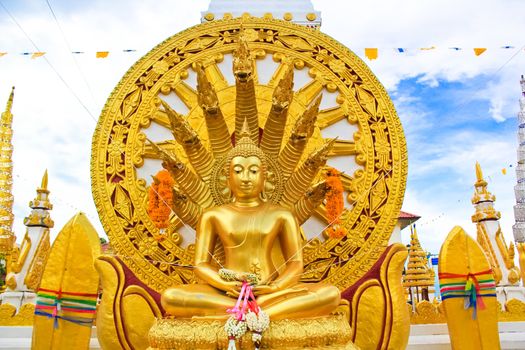 Golden Buddha with seven Nagas