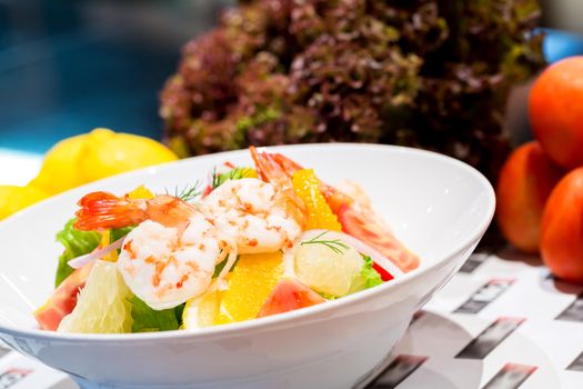 Prawn salad. Healthy Shrimp Salad with mixed greens and tomatoes.
