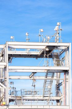Assembling of liquefied natural gas Refinery Factory with LNG storage tank using for Oil and gas industry background
