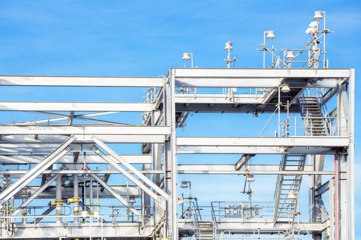 Assembling of liquefied natural gas Refinery Factory with LNG storage tank using for Oil and gas industry background