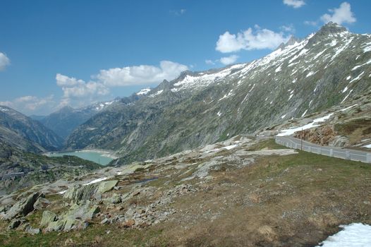 Valley and road in Alps somewhere in Switzerland