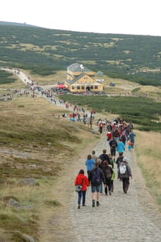 Crowd on trail in Karkonosze mountains in Poland / Czech republic