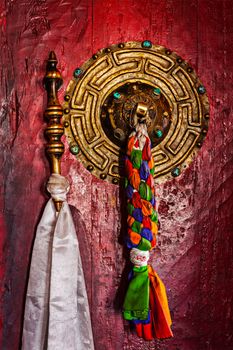 Door handle of gate door of gompa - Tibetan Buddhist monastery. Diskit, Nubra valley, Ladakh, India