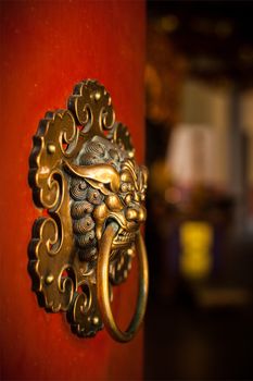 Doorknob of the Temple shaped as a jiaotu (dragon). Shuang Lin Temple, Singapore