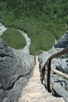 Wooden stairs on trail somewhere in Switzerland