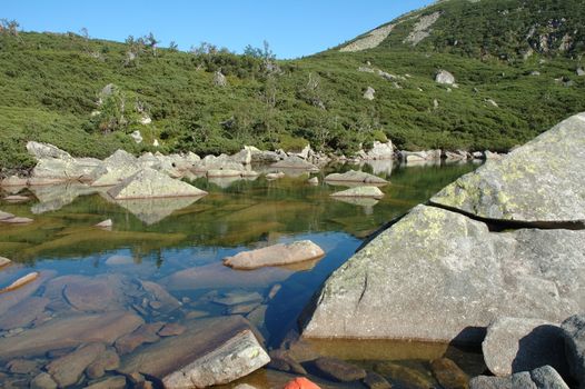 Pond in Sniezne Kotly in Karkonosze mountains in Poland / Czech republic