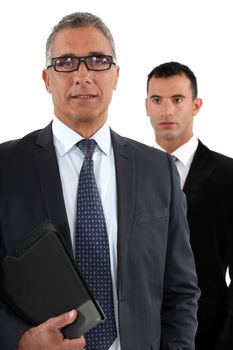 Businessman with young apprentice