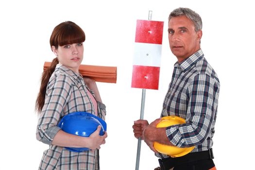 Daughter helping her roofer father