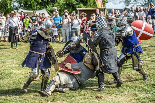LIW, POLAND 17 AUGUST: Members of Medieval Reinactment Order fight in Liw Tournament on 17 August 2013 in Liw, Poland
