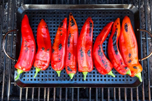 Chillies getting ready to be grilled on the grill