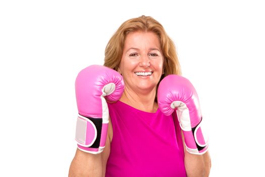 Happy female boxer with her pink gloves