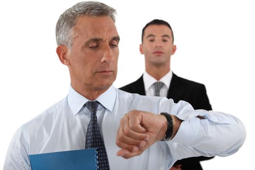 Businessman checking his watch