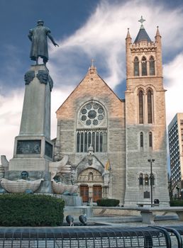 statue and cathedral in syracuse, new york