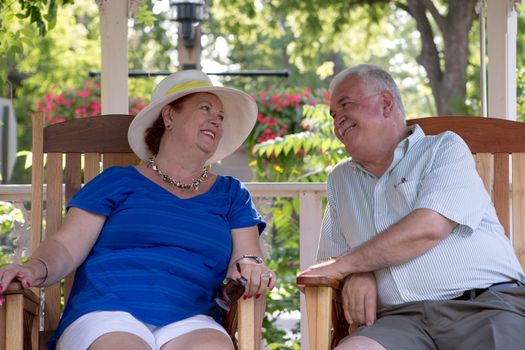 Senior couple looking at each other with trust and love