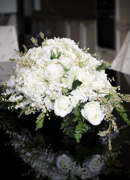 Artificial bouquet of peonies decorated in living room 