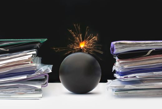 Exploding bomb inbetween two stacks of paperwork